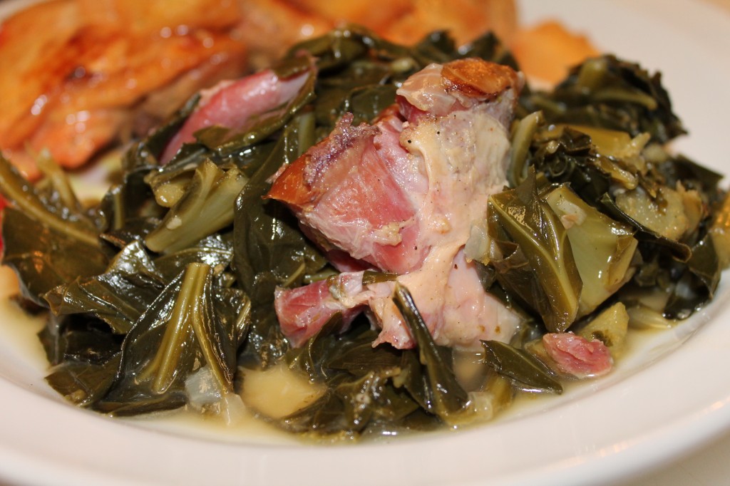 Traditional collard greens cooked with tasty ham hock