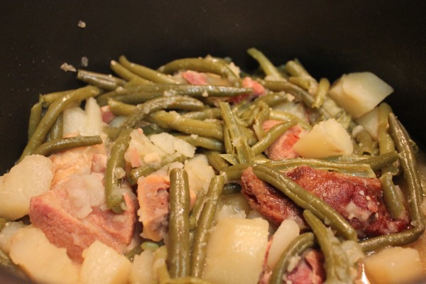 This tasty Southern Green Beans and Potatoes recipe is so versatile it can be served as a main course or a side dish, for Sunday dinner or a holiday meal! It is so flavorful! 