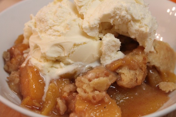 Delicious peach cobbler a la mode