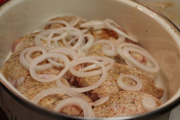 Chicken thighs baked to perfection with onion and seasoning