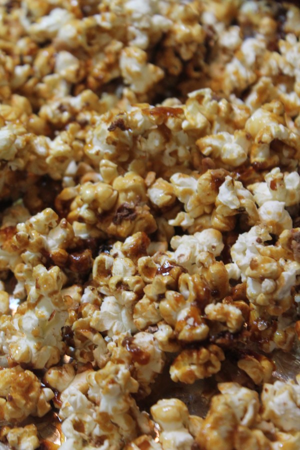 Tender white popcorn with bits of golden caramel and crunchy nuts. 