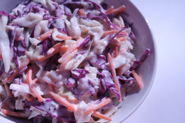 This creamy coleslaw is tangy and sweet with the perfect amount of crunch!