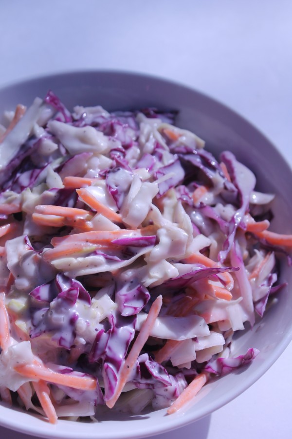 Crunchy carrots and cabbage mixed with a creamy dressing make this coleslaw a refreshing side dish