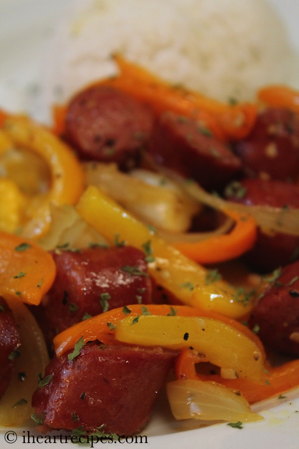 Toss together sausage, yellow and orange peppers, and onions for this quick, delicious dinner