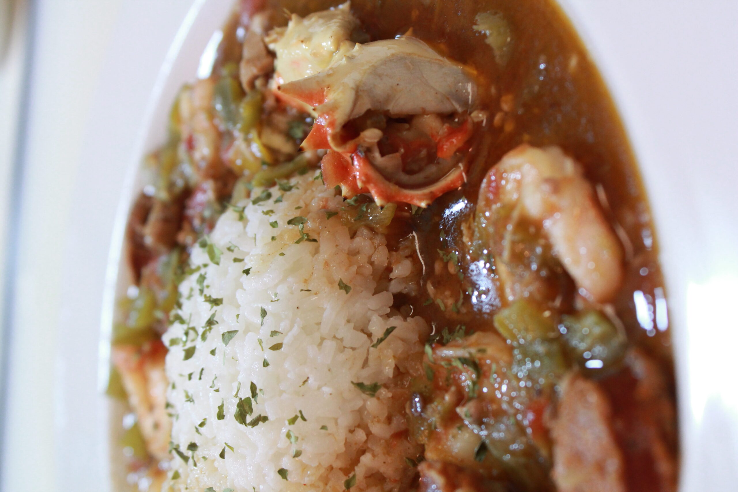 I made (a rouxless) “Gumbo” for the first time the other day. I posted the  finished dish on a subreddit that was hurtful and unhelpful. So I just need  a community with, image size:2560x1707