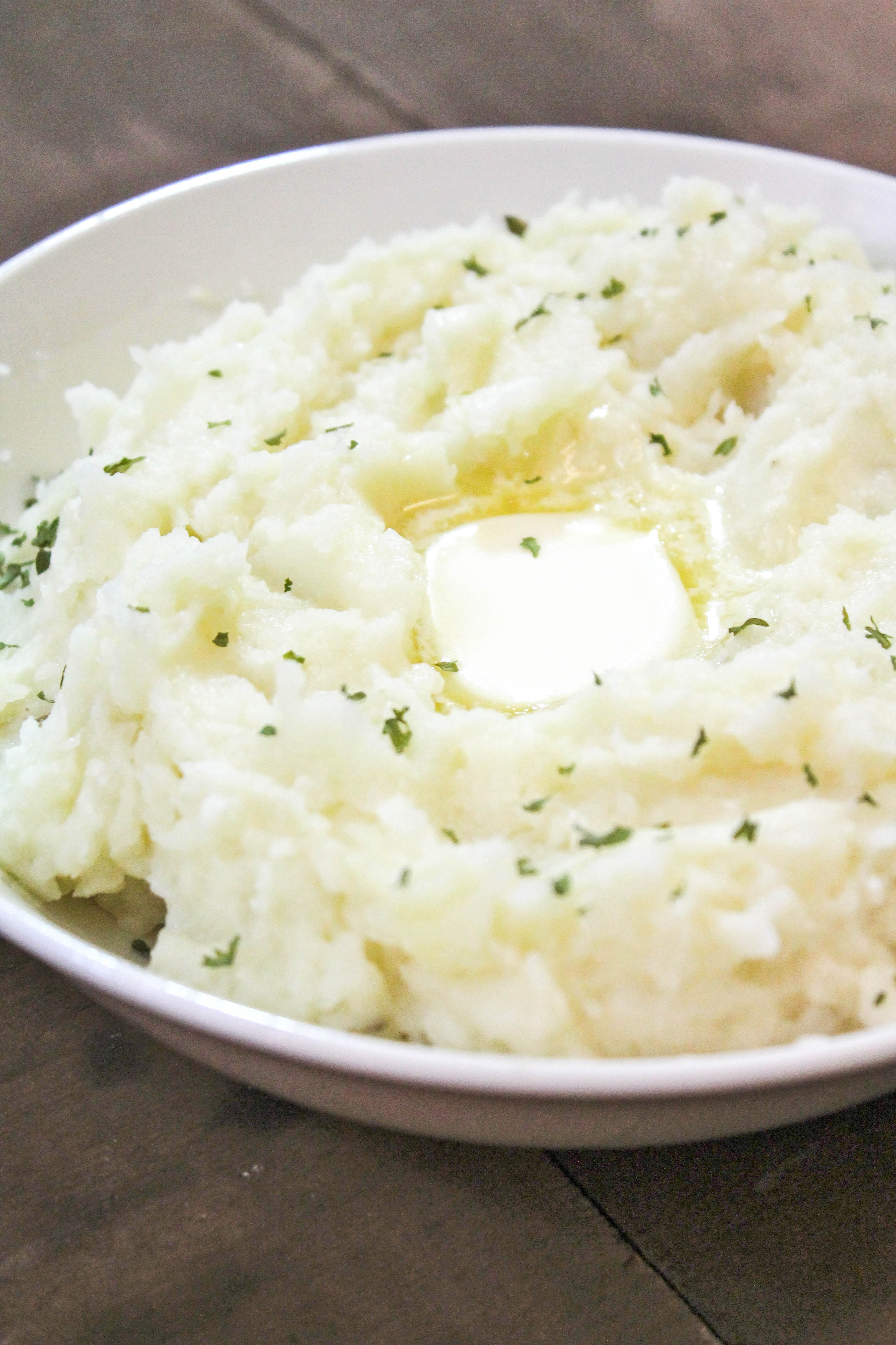 Creamy homemade mashed potatoes with butter and chives