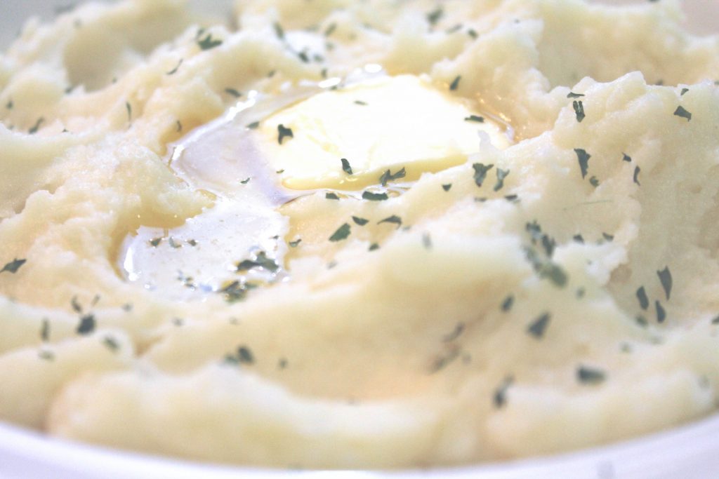 These creamy mashed potatoes are decadent served with butter. 