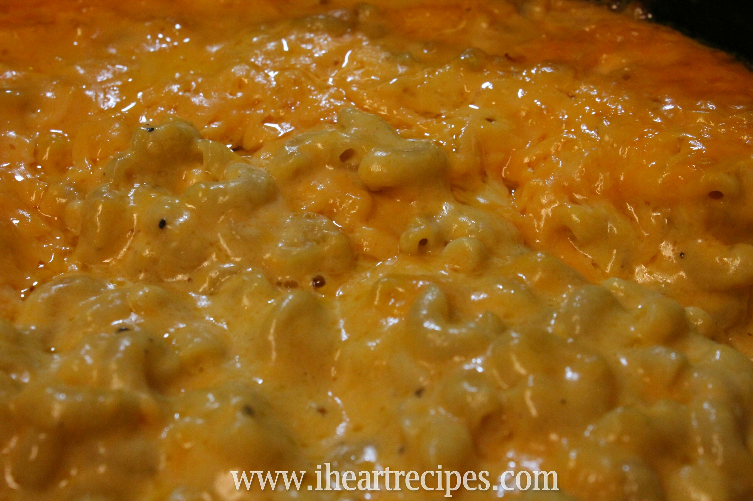 homemade mac and cheese baked in glass bowl