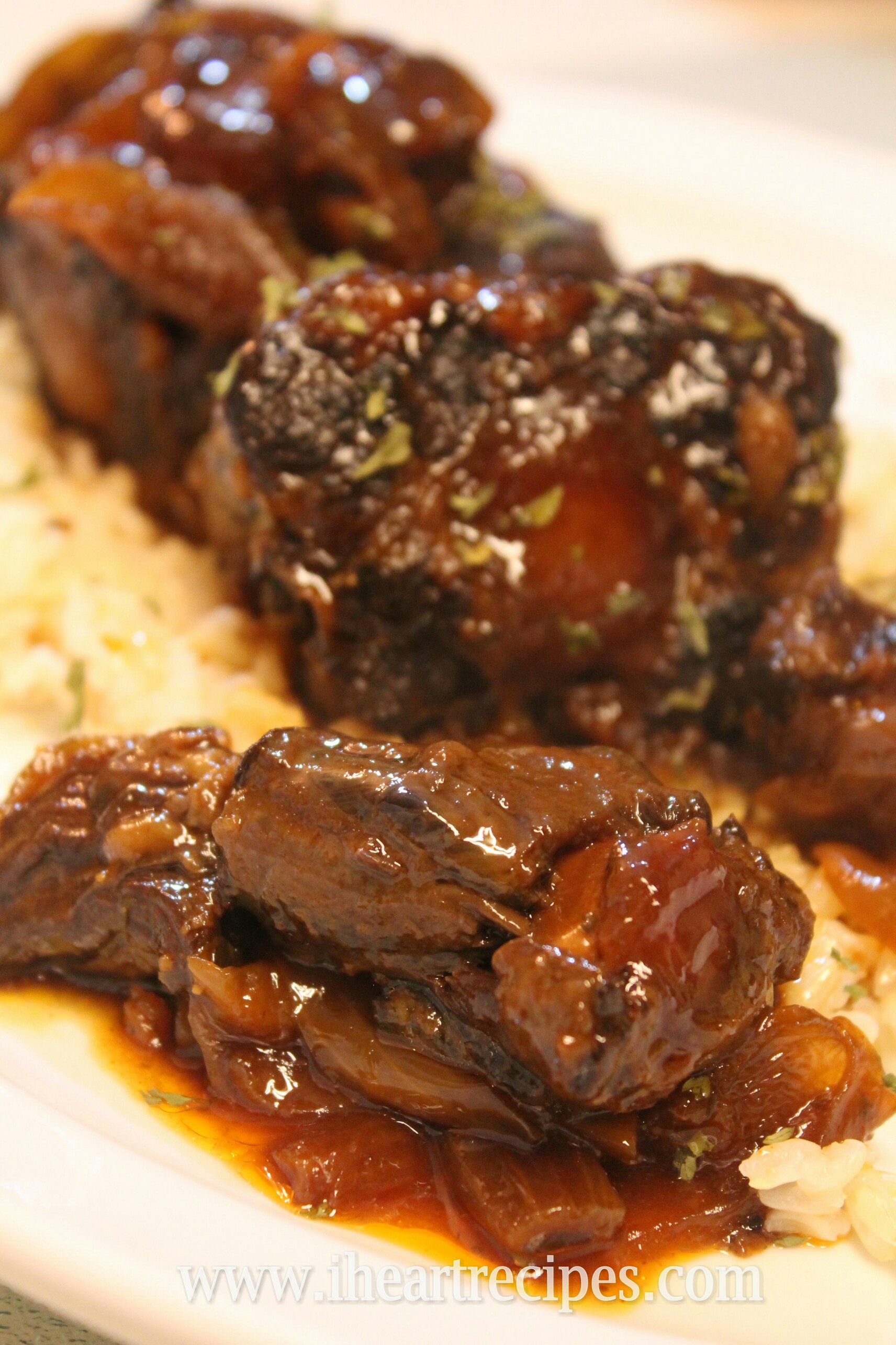 These tender oxtails are slow cooked with a sweet and spicy BBQ sauce