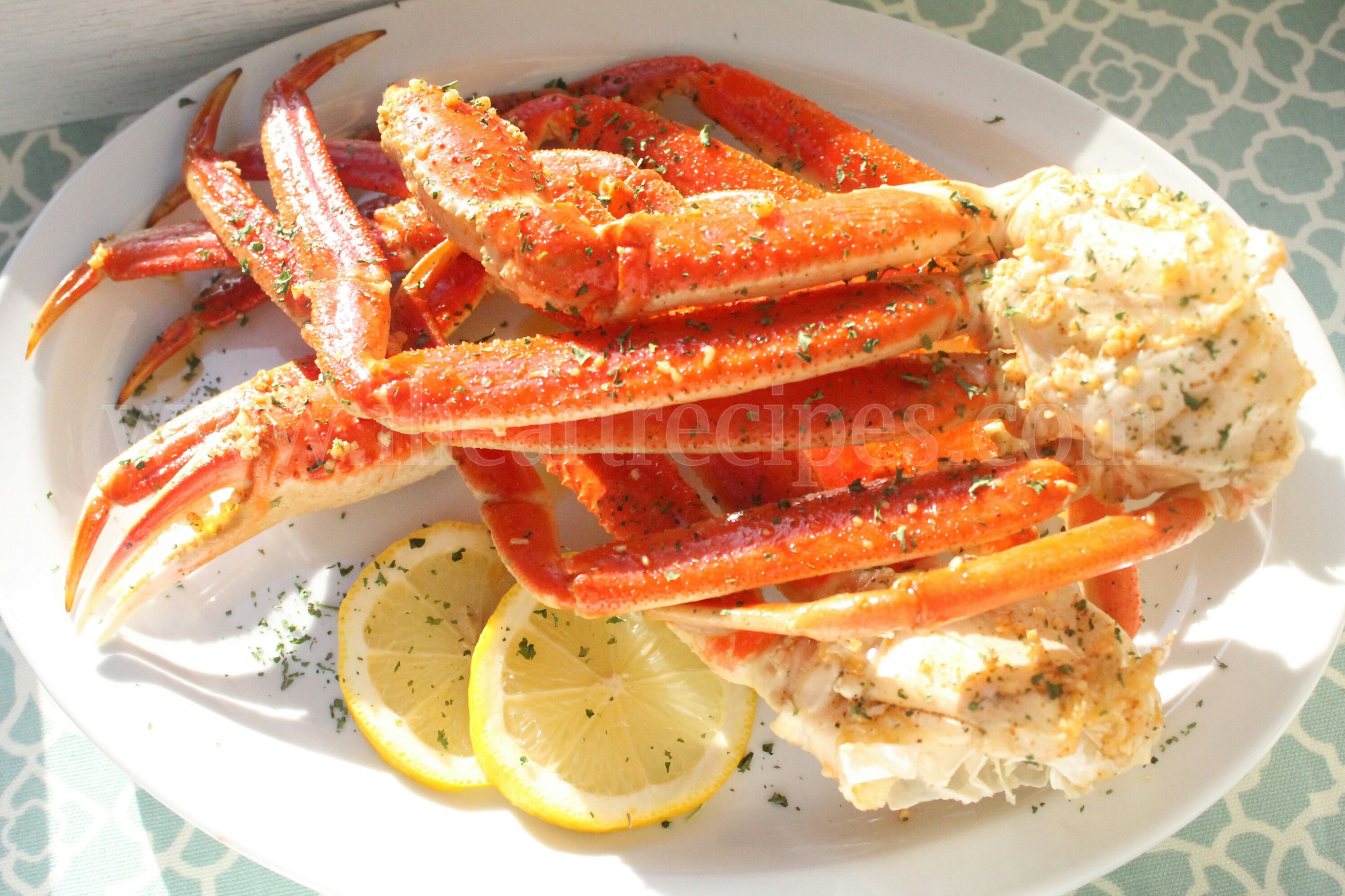 This super easy crab legs recipe is made in the oven, with tons of delicious butter, garlic, and lemon. 