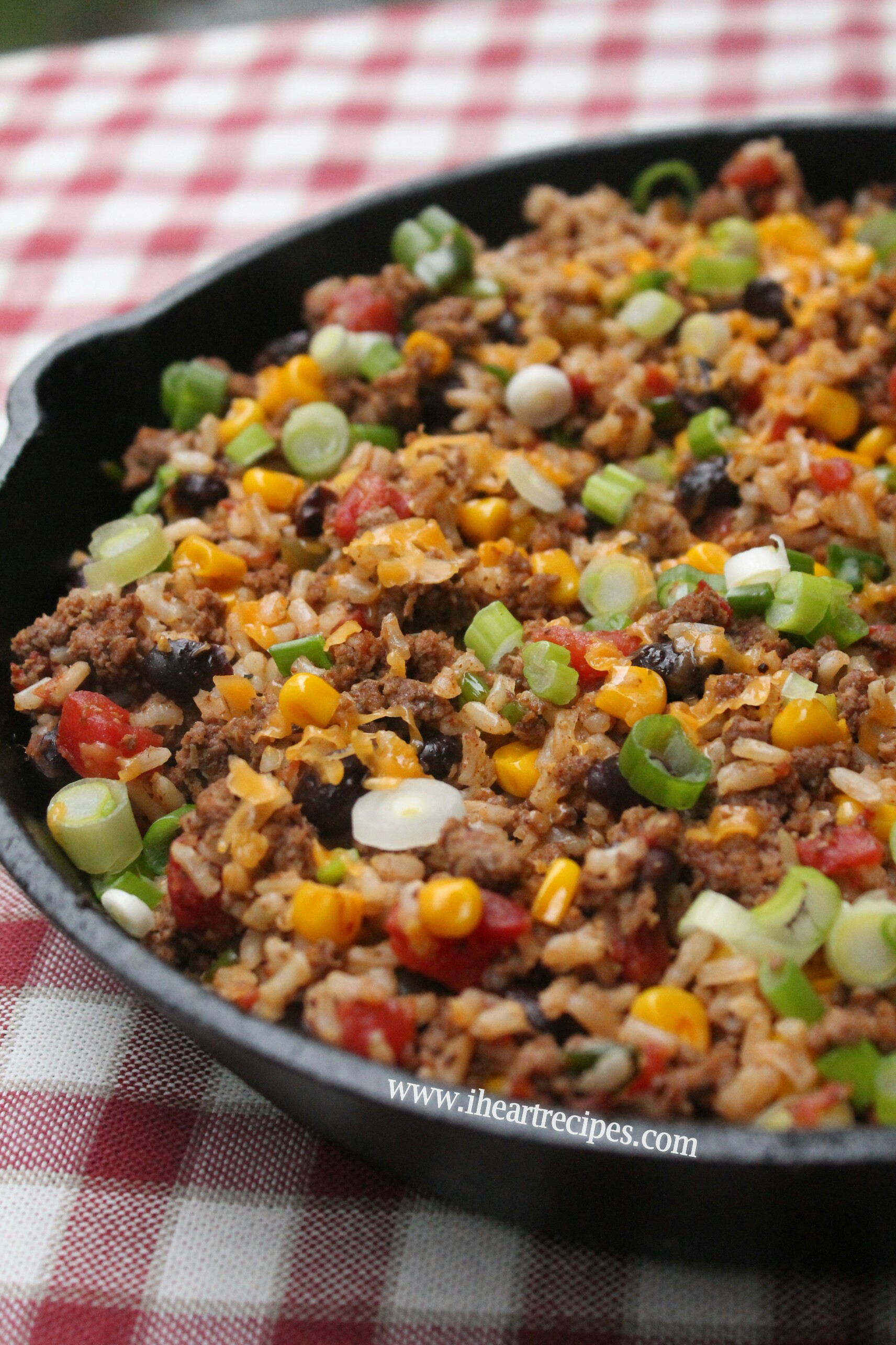 This skillet meal has all the flavors of the Southwest in one bite. Look at the corn, beans and peppers mixed in with the rice.