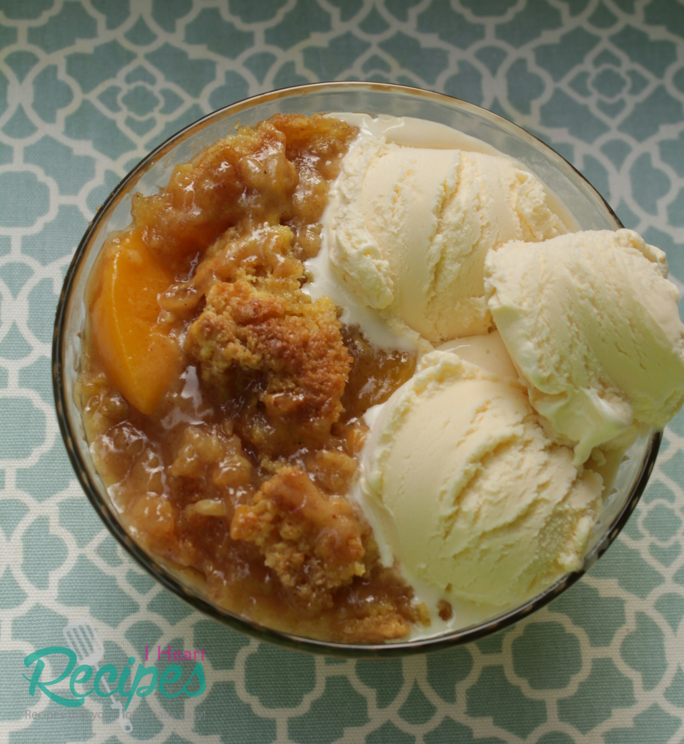 Juicy Ciroc vodka infused peaches with a crispy cobbler crumble paired with vanilla ice cream