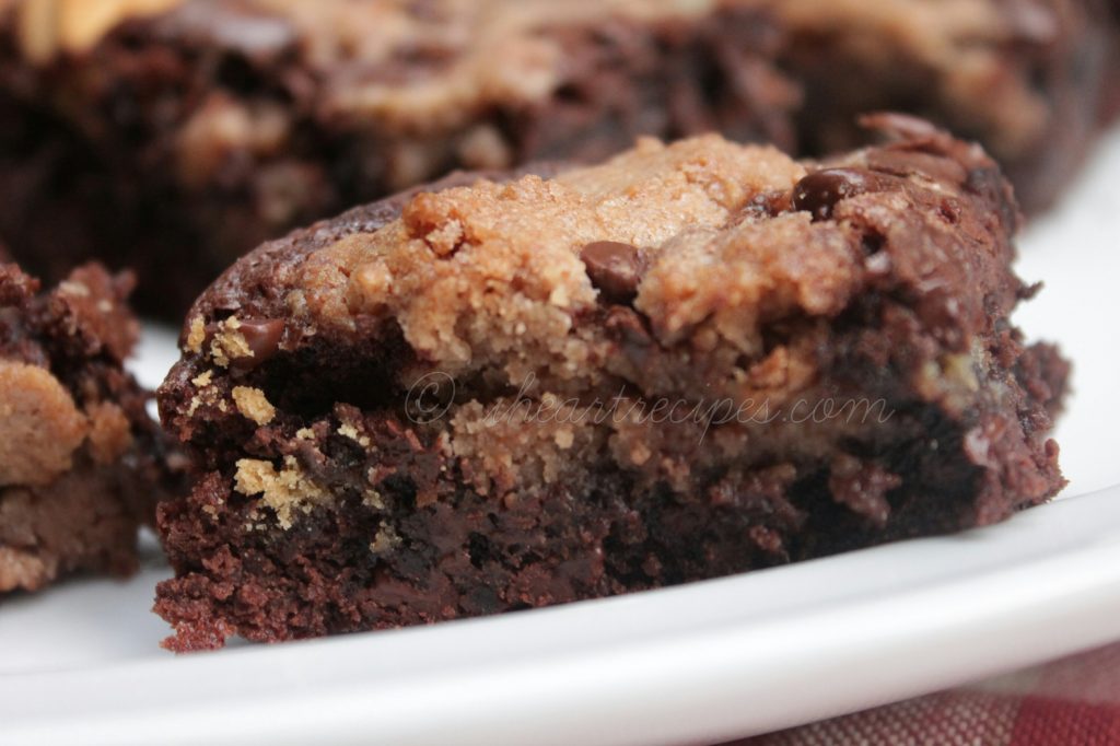 A piece of moist Oreo Chocolate Chip Brownies on a white plate. 