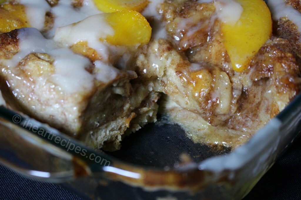 Moist bread pudding topped with sweet peach cobbler topping is a combination of 2 classic southern desserts