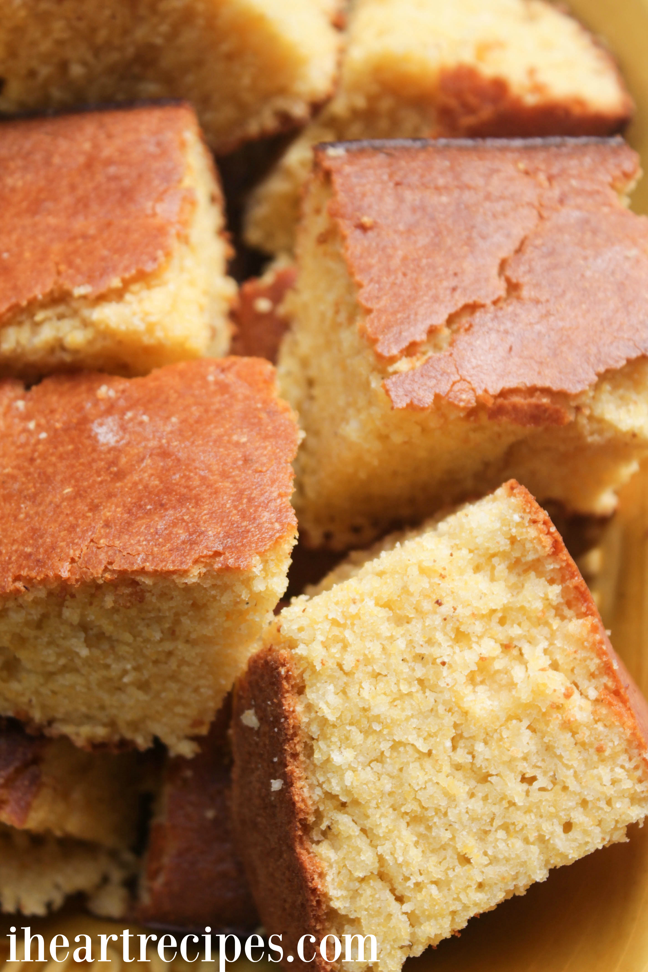 Sweet and tender cornbread squares with a golden brown crust. 