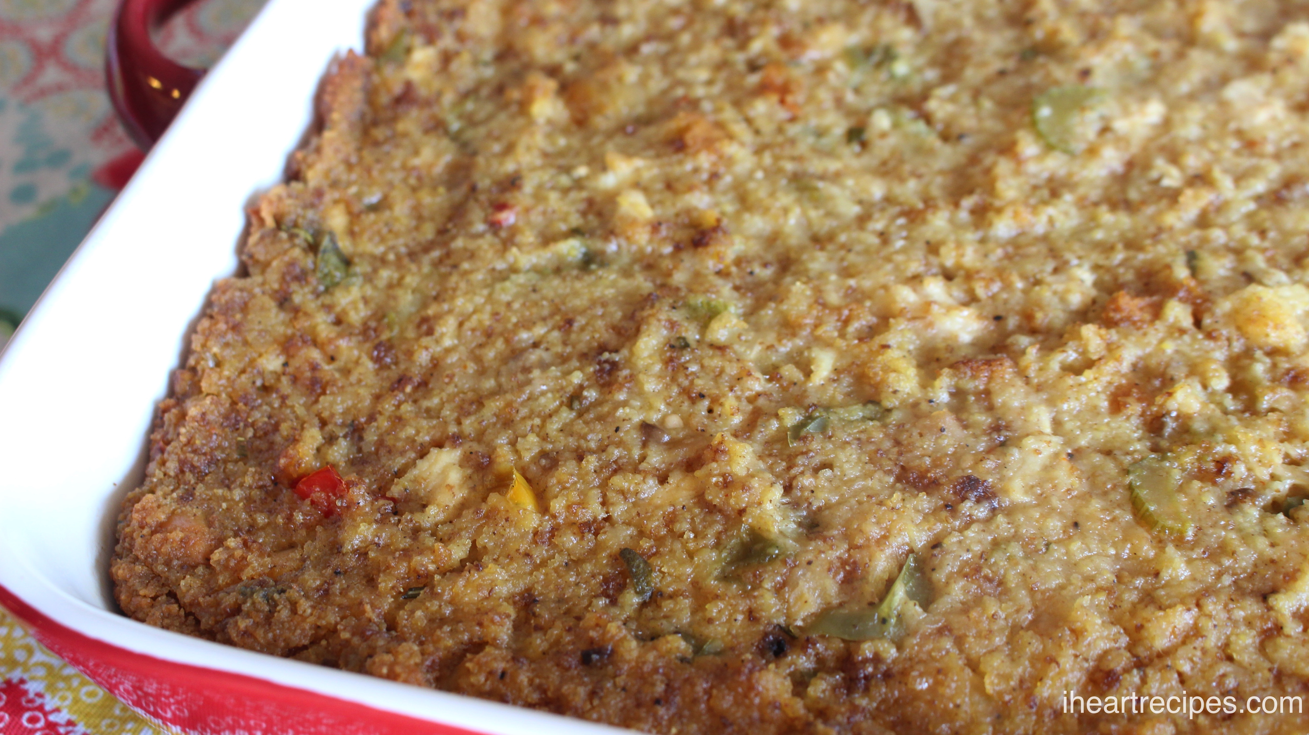 Classic Southern Cornbread Dressing served in a red and white baking dish. This will quickly become a family favorite!