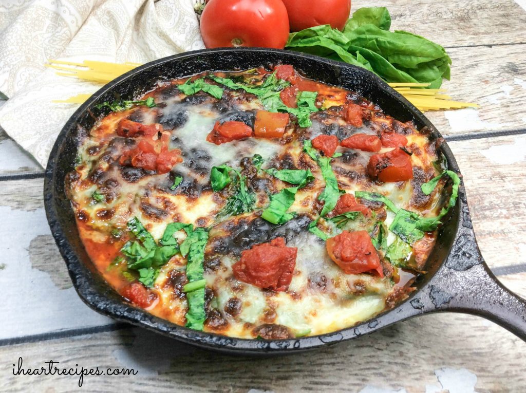 An easy one-skillet meal of semi-homemade chicken parmesan—breaded chicken covered in a hearty marinara sauce, melty mozzarella and parmesan cheese, and fresh basil.