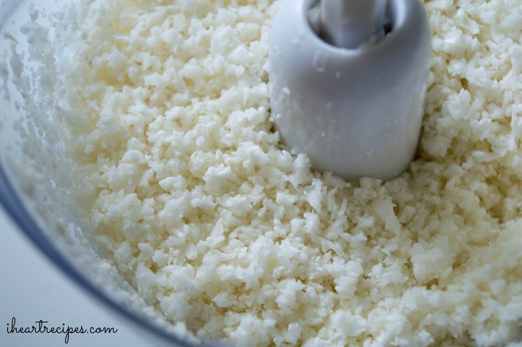 Riced cauliflower in a food processor.