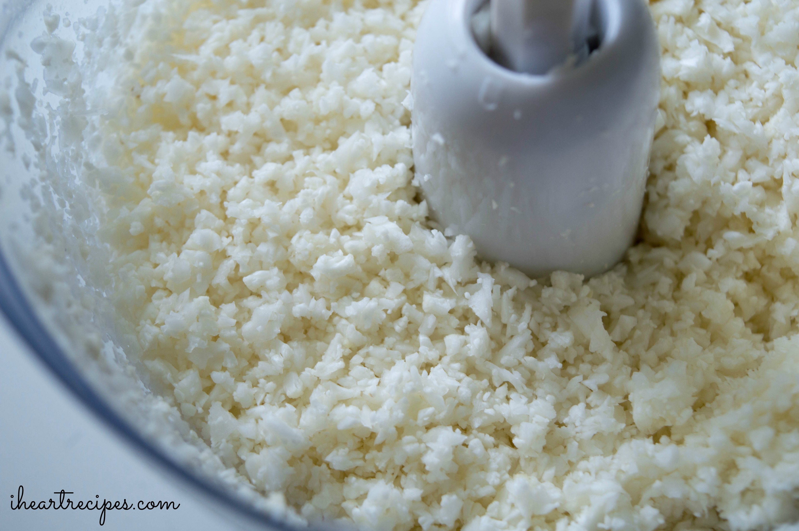 Riced cauliflower is made by tossing a head of rice into a food processor and pulsing it.