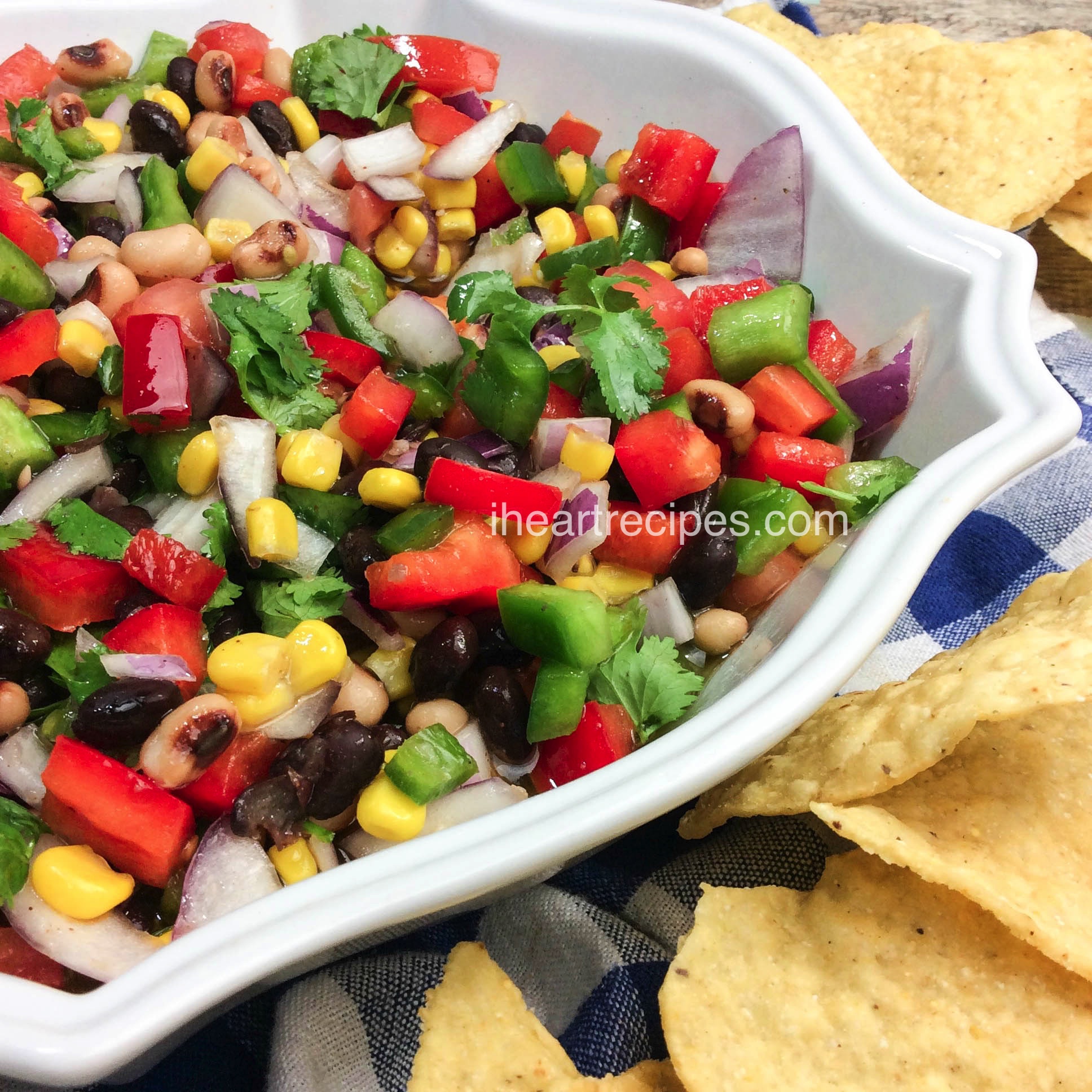 Crunchy tortilla chips compliment this bowl full of bright and tasty Texas Caviar. It's easy and delicious! 