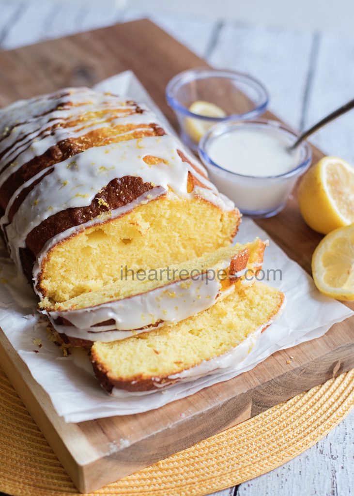 Moist lemon pound cake drizzled with sweet icing and tart lemon zest.