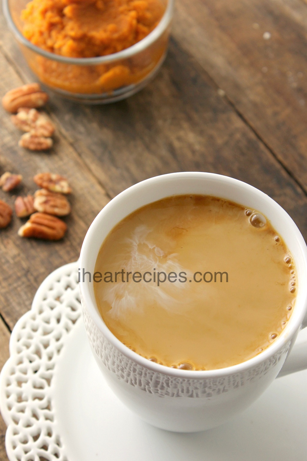 A creamy homemade pumpkin spice latte served in a simple mug is just the right amount of cozy.