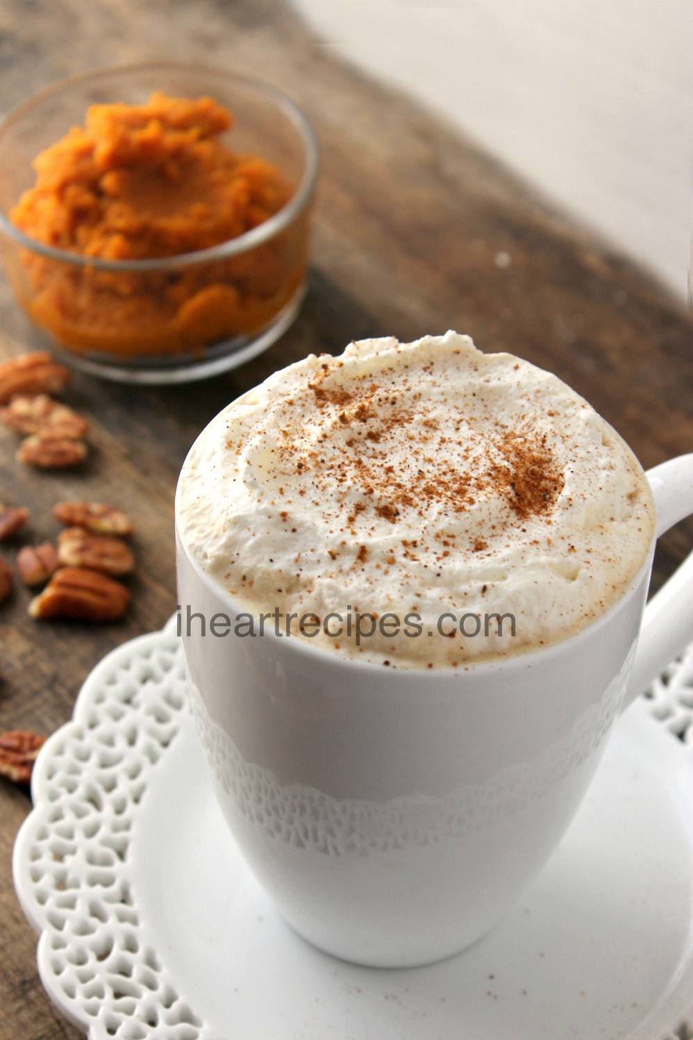 A homemade pumpkin spice latte served in an elegant cup to be enjoyed in the comforts of home!