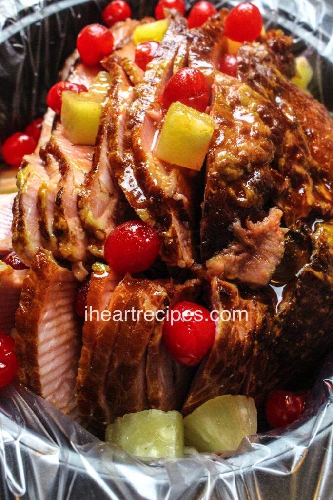 Delicious and flavorful, slow cooker spiral ham with pineapple and cherries