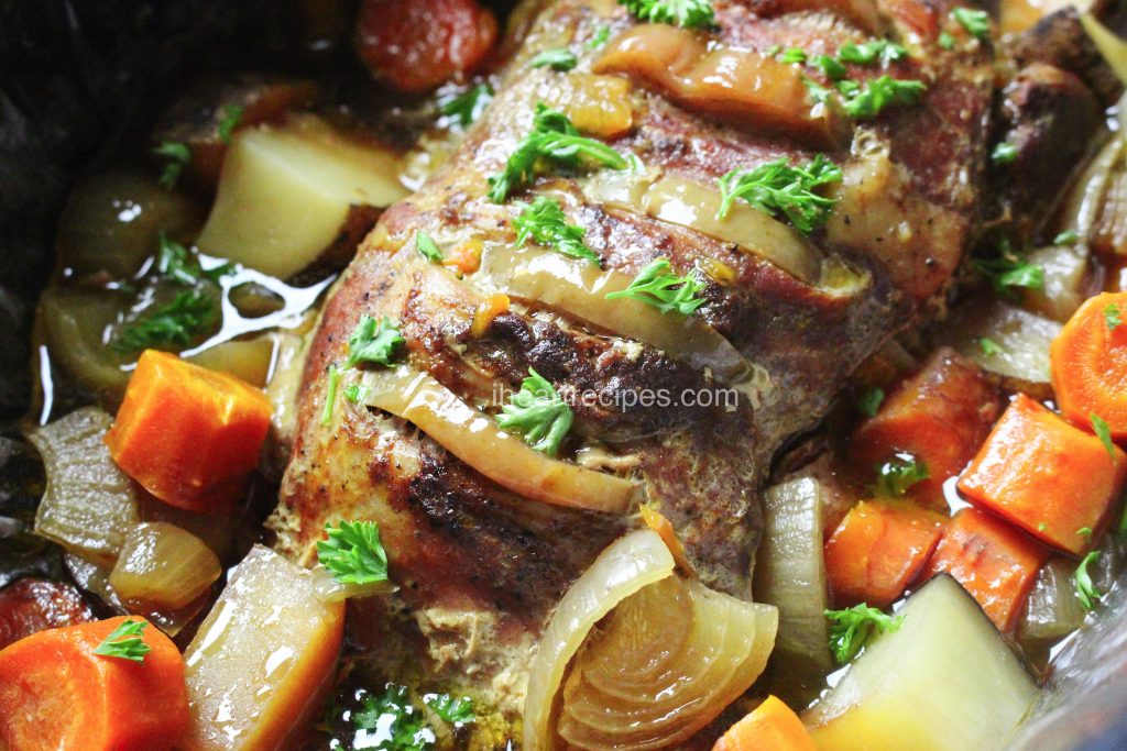 Caramelized vegetables pair perfectly with this maple and apple butter stuffed pork sirloin
