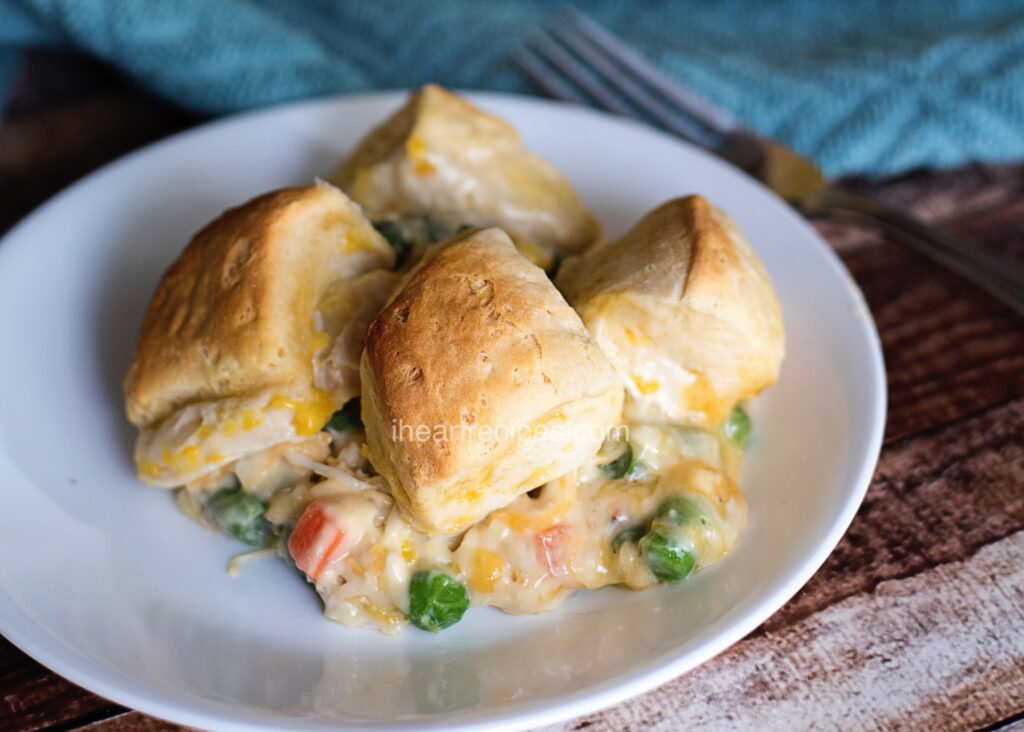 Delicious and creamy chicken pot pie is topped with flakey, buttery biscuits.
