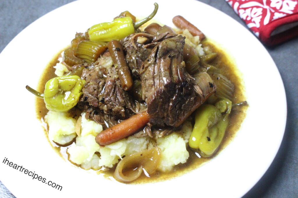 Tender pot roast is slow cooked for hours for a hearty, filling dinner
