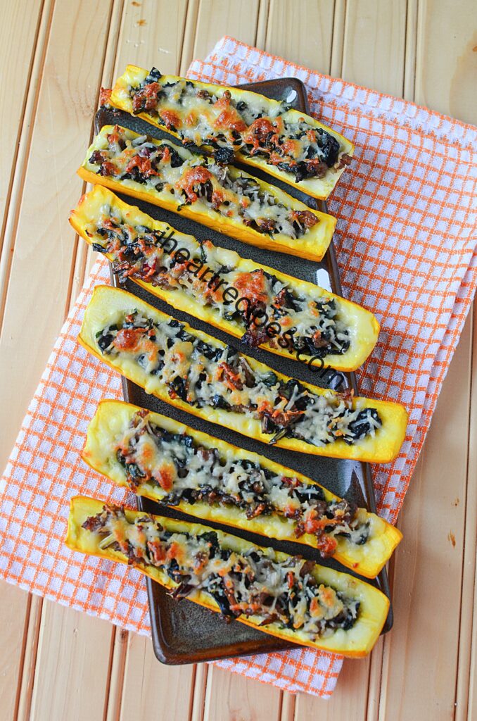 Sausage and swiss chard filled squash boats are a perfect party appetizer or side dish
