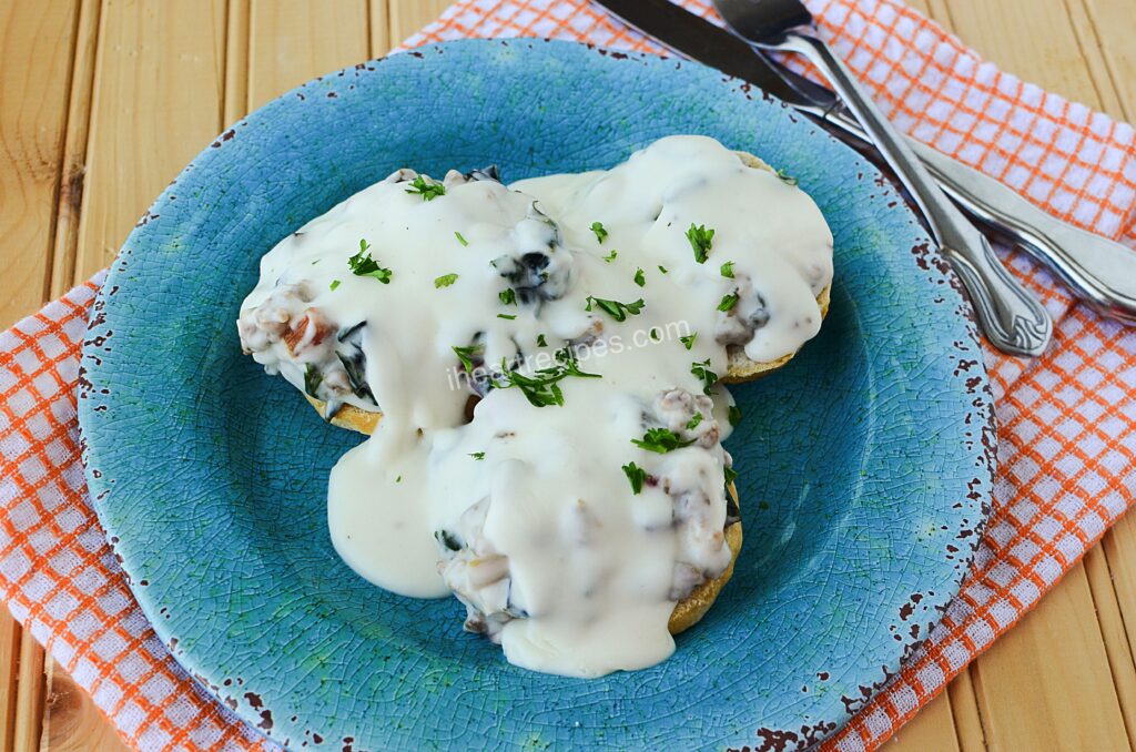 Light and fluffy biscuits are the delicious base for this savory Sausage and Swiss Chard Biscuits and Gravy.