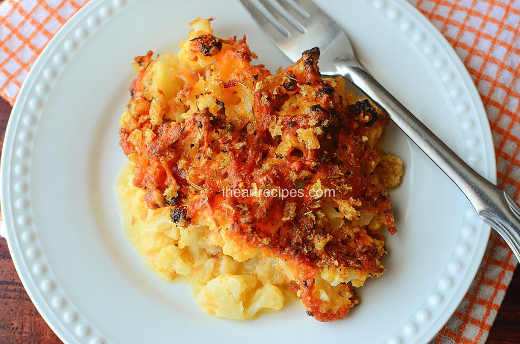 This low carb mac and cheese is made with cauliflower instead of pasta for a healthy alternative to a comfort food fave!