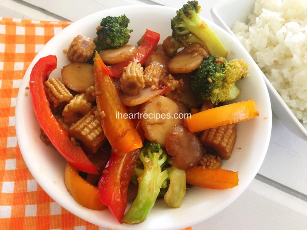 stir fry with broccoli, red peppers, baby corns, and water chestnuts from I Heart Recipes