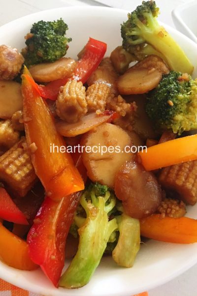 stir fry with broccoli, red peppers, baby corns, and water chestnuts