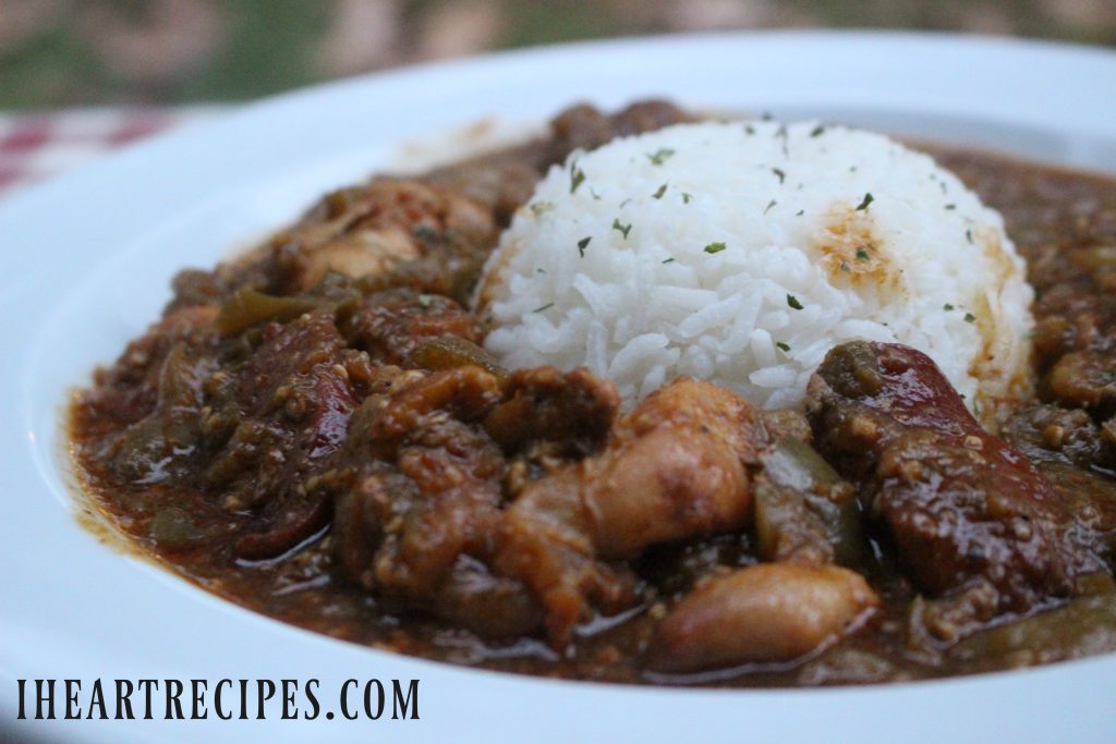 Tender chicken and okra in a delicious gravy over tender white rice served in a simple white dish.