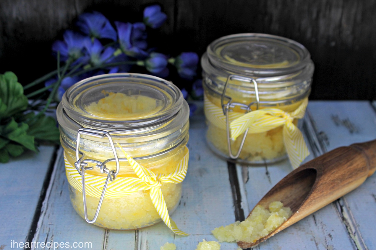 Petite glass jars filled with sunshine-yellow lemon body scrub ready to be gifted!