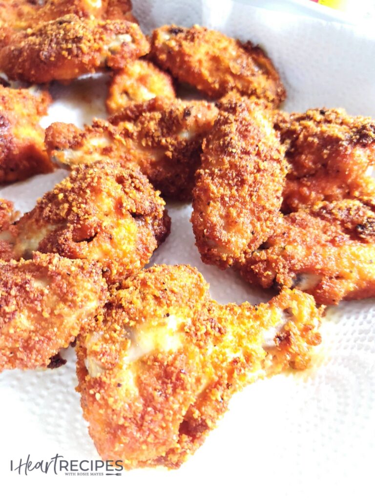 Delicious golden-brown keto fried chicken, coated with a low-carb spicy pork rind breading and oven-baked to crispy perfection.