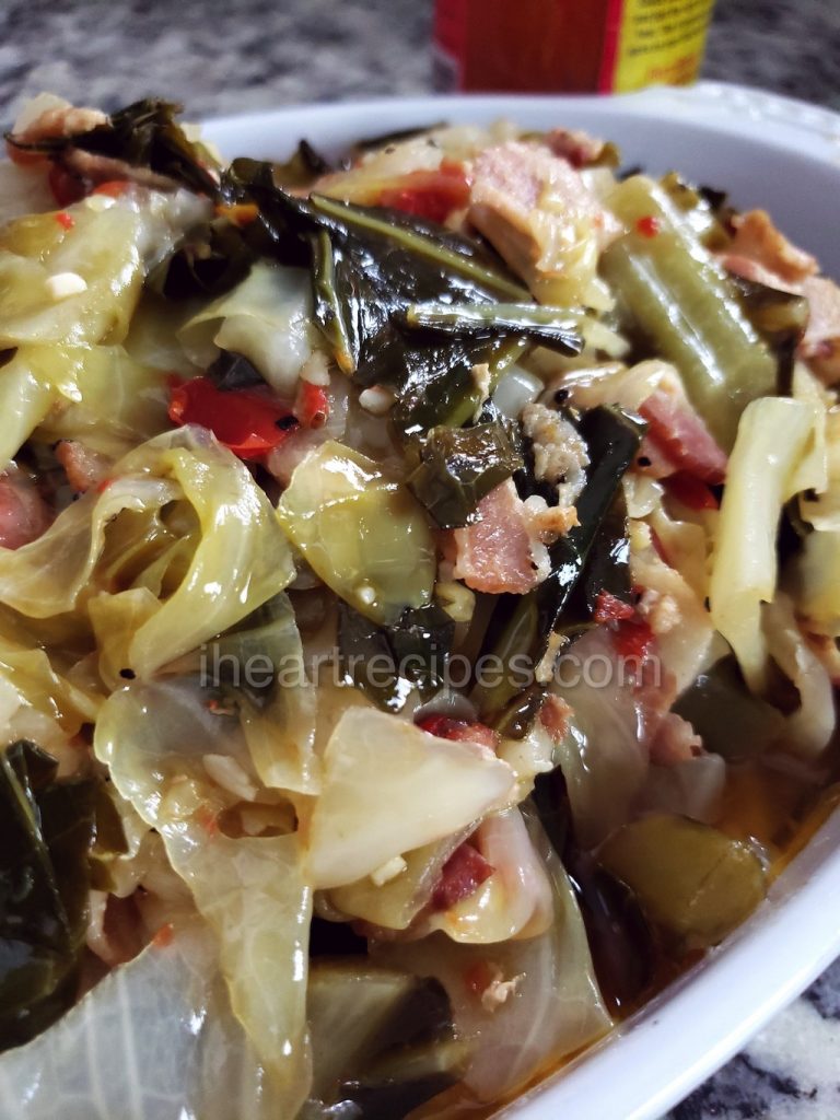 Perfectly cooked collard greens and cabbage with bacon, garlic, and onions