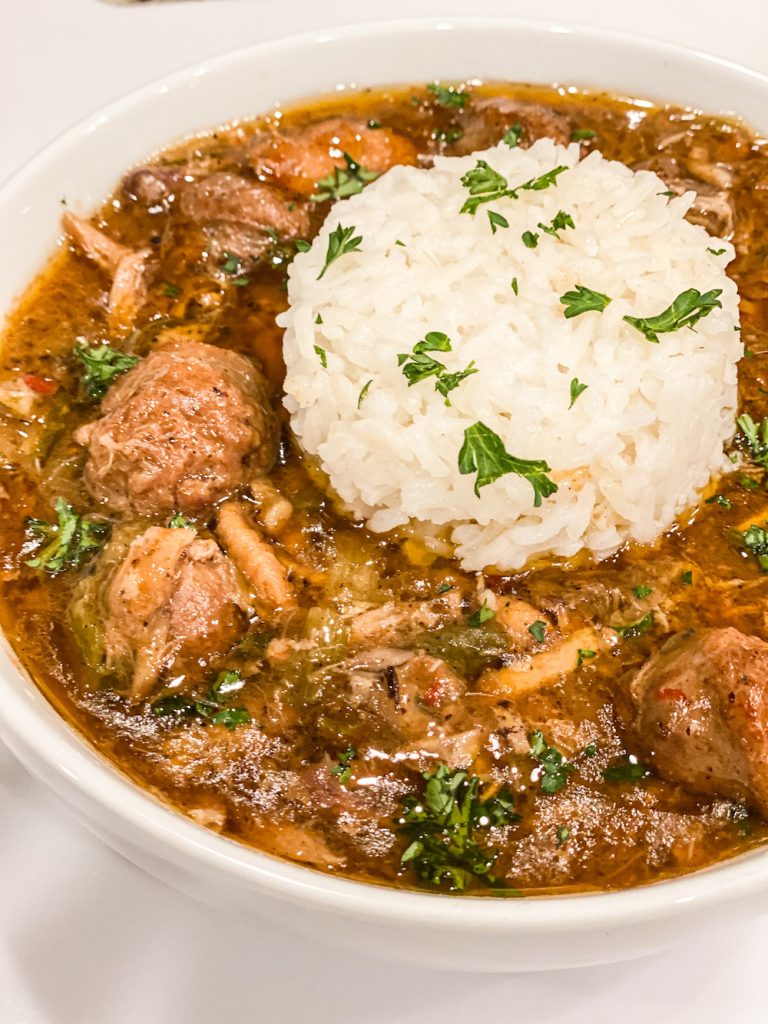 Serve Chicken and Sausage Gumbo with a side of white rice.