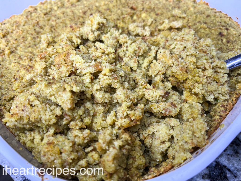 A casserole dish full of homemade cornbread dressing, perfect for the holidays.