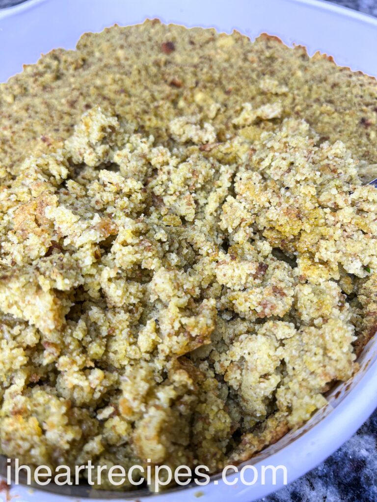 A large casserole dish full of freshly baked homemade southern cornbread dressing.