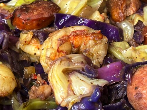 Cajun fried cabbage with sausage and shrimp.