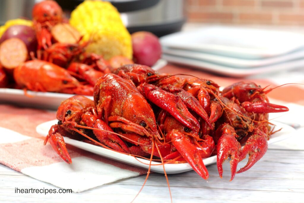 A plateful of cooked, bright red crawfish. 