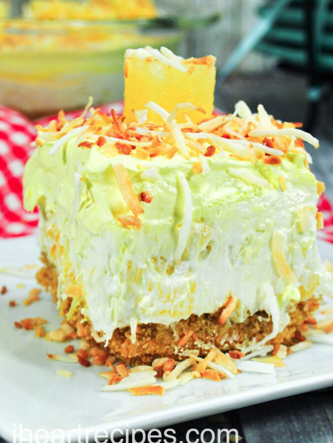 A slice of no-bake pina colada cheesecake.