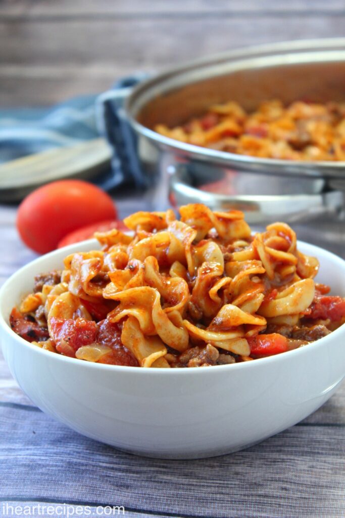 A bowl of Sloppy Joe pasta -- egg noodles mixed with ground beef and a zesty tomato sauce.