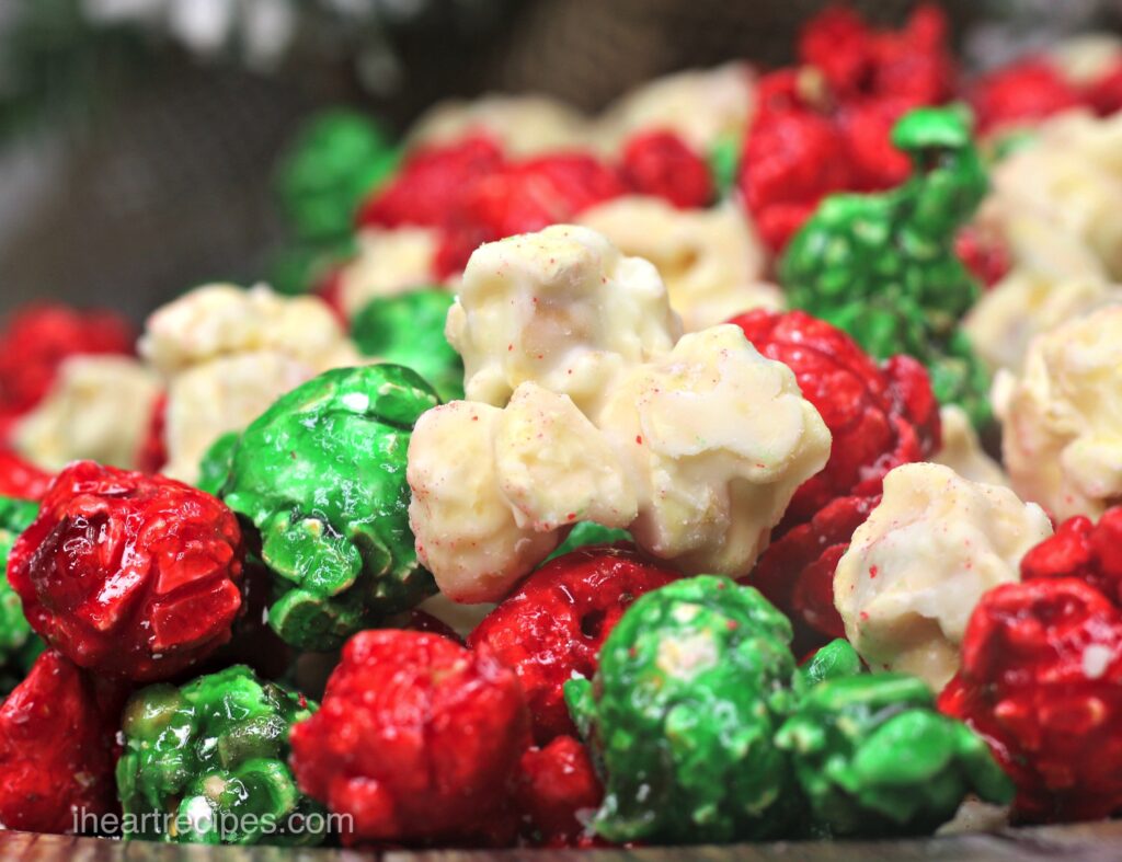 A close up image of puffy red, green and white Christmas popcorn.