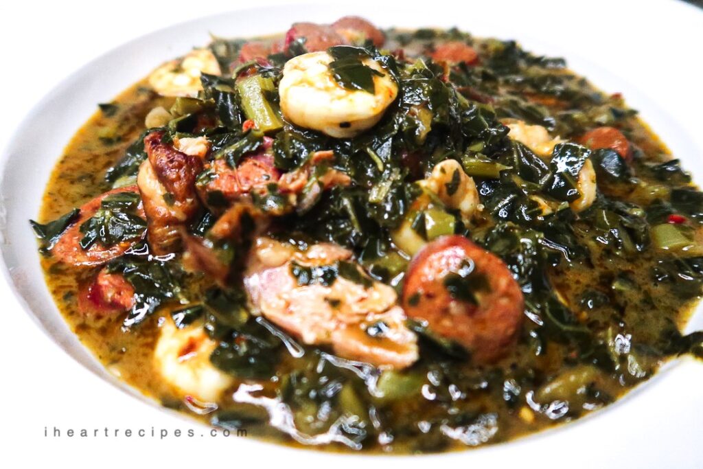 Gumbo Greens fill a white bowl. 