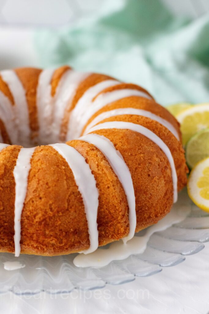 A close up of a golden dessert with icing .